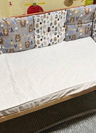 Бортики подушки двусторонние  в детскую кроватку на 3 стороны1 фото