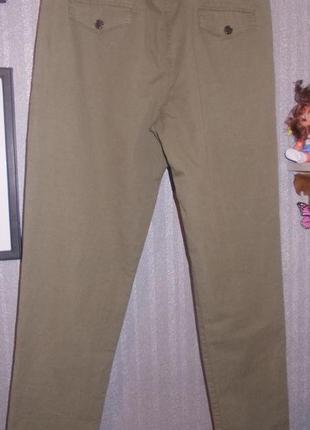 Нові штани хлопкові хакі колір 44-46р. зі складочками зпереду.3 фото