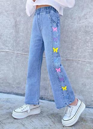 Стильные джинсы на девочку с бабочками3 фото