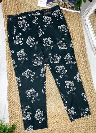 Стрейчеві штани з квітковим принтом з биркою1 фото