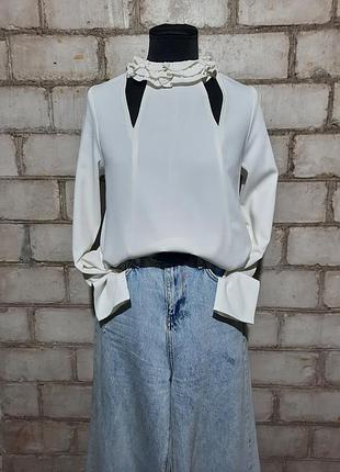 Стильна блуза а-силуету в рубчик