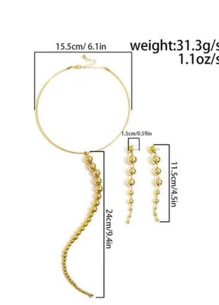 Комплект бижутерии: ожерелье колье цепочка золотистая и серьги длинные вечерние золотистые2 фото