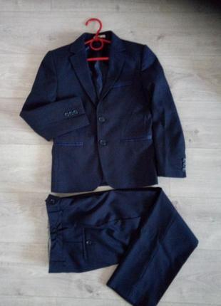 Супер шкільний костюм на хлопчика темно синього кольору