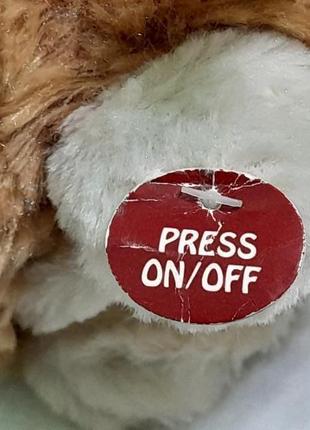 Іграшка м'яка інтерактивна sainsbury`s - співаючий песик , 18 см .