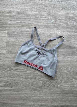 Стильный спортивный бюстгальтер топ reebok 38/m9 фото