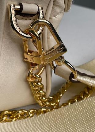 Жіноча сумка louis vuitton wave multi pochette cream/gold6 фото