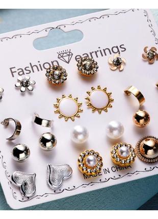 Біжутерні сережки набір 12 пар  золотисті гвоздики fashion earrings gold