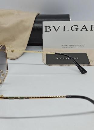 Очки в стиле bvlgari женские солнцезащитные зекальные сине фиолетовый градиент в золотом металле4 фото