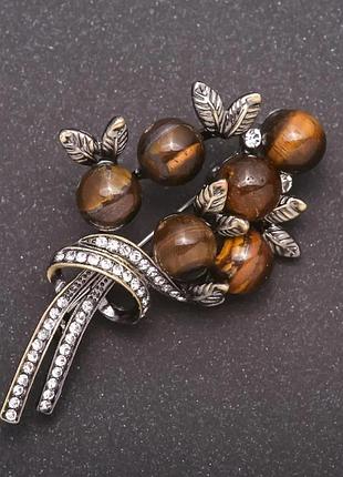 Брошка тигрове око