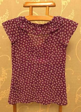 Очень красивая и стильная брендовый блузка в цветашках.2 фото