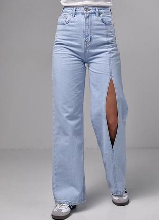 Модные джинсы клешь с вырезом спереди 34-40 размеры голубые4 фото