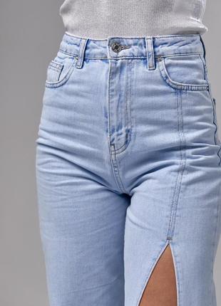 Модные джинсы клешь с вырезом спереди 34-40 размеры голубые5 фото