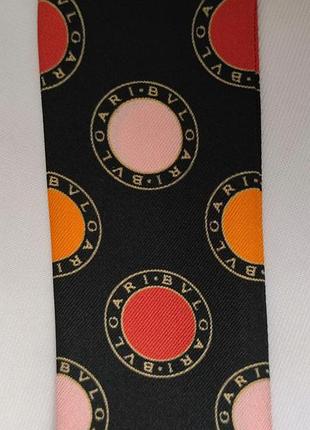 Bvlgari multi logo silk twilly  шелковвй шарф /9484/6 фото