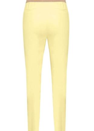 Женские зауженные к низу брюки желтого цвета. модель adoncia zaps. коллекция весна-лето 20244 фото