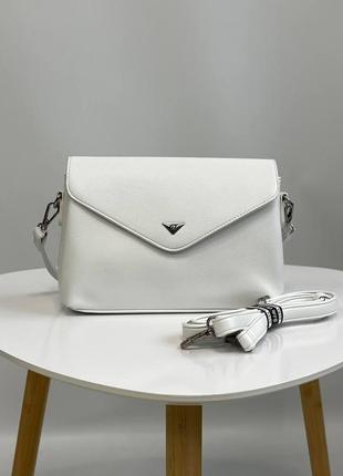 Белая женская сумка кросс-боди на плечо из эко кожи итальянского бренда gildatohetti.1 фото