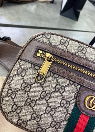 Поясна сумка коричневого кольору gucci ophidia gg supreme c7744 фото