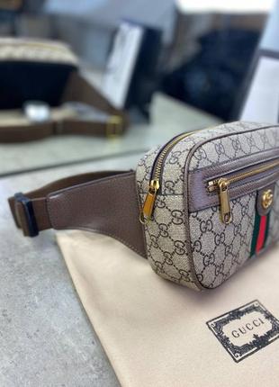 Поясна сумка коричневого кольору gucci ophidia gg supreme c7747 фото