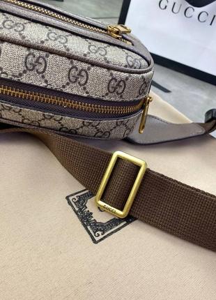 Поясна сумка коричневого кольору gucci ophidia gg supreme c7745 фото