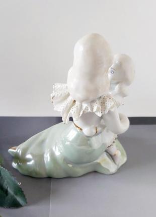 Винтажная фарфоровая статуэтка мама с ребенком румания5 фото