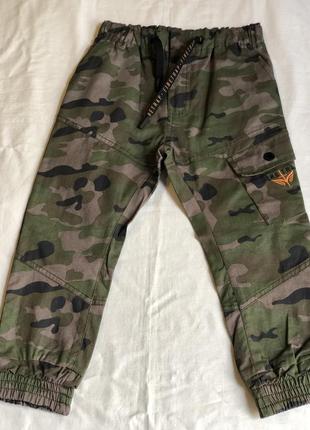 Штани з карманом на боку