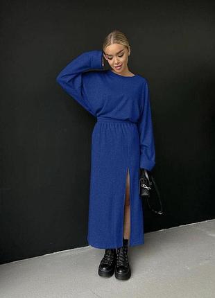 Синий костюм с юбкой,размер с/м