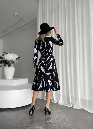 Якісна чорна стильна сукня міді на ґудзиках5 фото