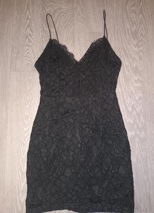 Черное сетевое мини платье на тоненьких брителях1 фото