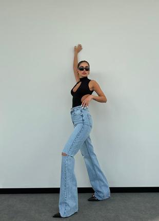 Женские голубые стильные трендовые джинсы с разрезами 100% котон.5 фото