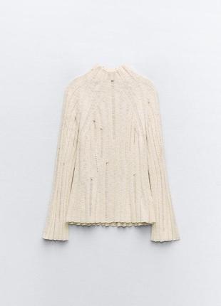 Трикотажный свитер в рубчике с подертостями7 фото