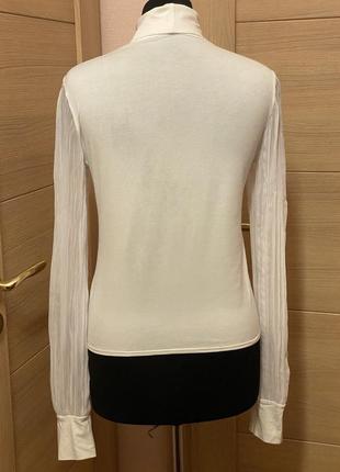 Нова трикотажна  брендова блуза, гольф маха білого кольору на 48 розмір або л7 фото