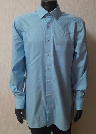 Шикарная хлопковая рубашка голубого цвета в клетчатый узор olymp luxor modern fit