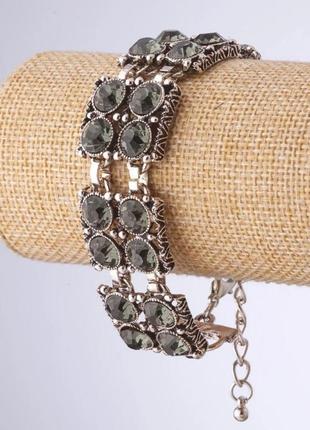 Браслет з сірими кристалами