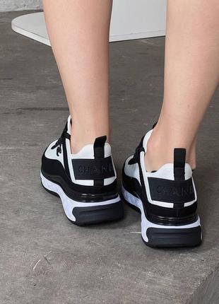 Жіночі шкіряні кросівки chanel sneakers black/white шанель кросівки текстиль + шкіра наложка3 фото