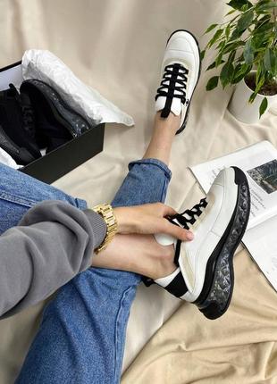 Жіночі шкіряні кросівки chanel sneakers black/white шанель кросівки текстиль + шкіра наложка7 фото