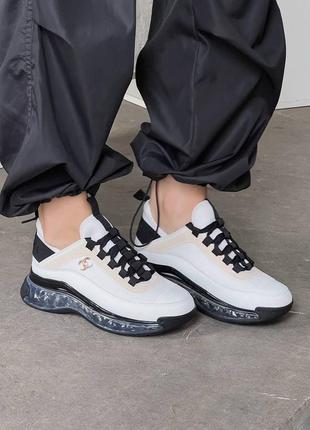 Жіночі шкіряні кросівки chanel sneakers black/white шанель кросівки текстиль + шкіра наложка1 фото