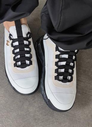 Жіночі шкіряні кросівки chanel sneakers black/white шанель кросівки текстиль + шкіра наложка7 фото