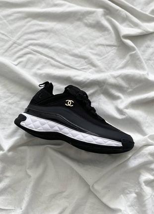 Жіночі шкіряні кросівки chanel sneakers black/white шанель кросівки текстиль + шкіра наложка1 фото