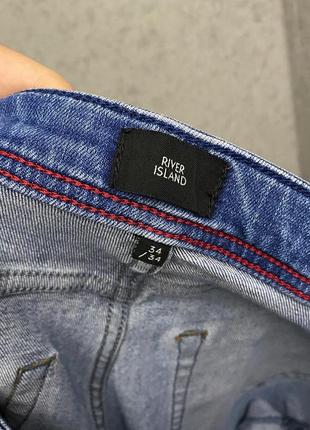 Голубые джинсы от бренда river island5 фото