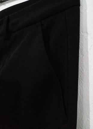 Класичні завужені брюки з манжетами високий зріст2 фото