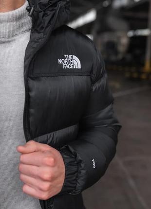 Куртка зимняя в стиле the north face черная, светоотражающий лого.6 фото