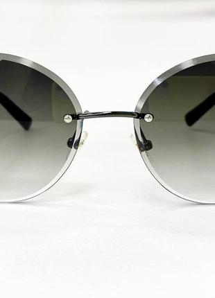 Окуляри сонцезахисні жіночі безоправні круглі з легким тонуванням тоненькі пластикові дужки