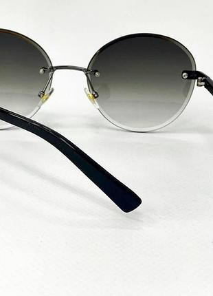 Окуляри сонцезахисні жіночі безоправні круглі з легким тонуванням тоненькі пластикові дужки