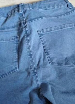 Фірмові джинси з вишивкою5 фото