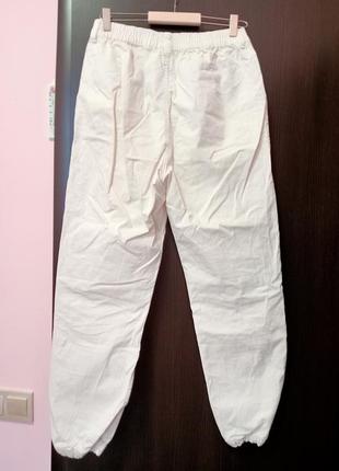 Білі штани2 фото