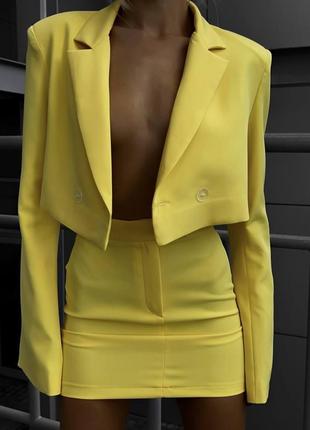 Костюм вкорочений жакет піджак спідниця міні коротка юбка олівець комплект стильний трендовий яскравий синій зелений жовтий8 фото