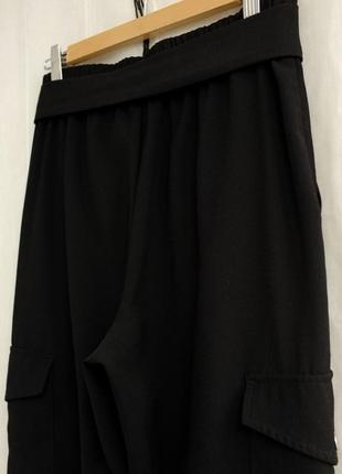 Чорні штани карго з накладними кишенями розмір s8 фото