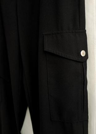 Чорні штани карго з накладними кишенями розмір s5 фото