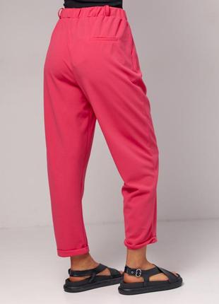 Трикотажні брюки жіночі з відворотом вкорочені рожеві фуксія2 фото