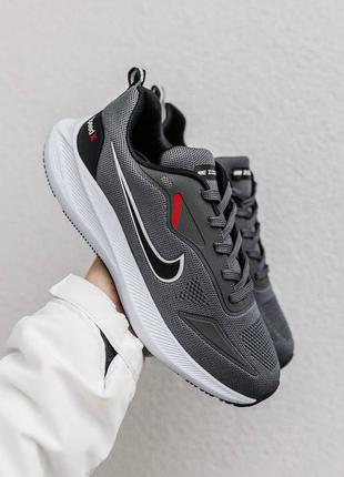 Демисезонные серые кроссовки nike air zoom в сеточку сірі демісезонні кросівки nike zoom7 фото