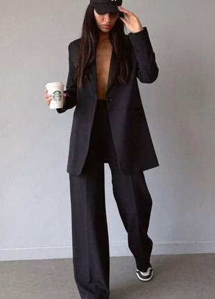 Костюм жіночий однотонний класичний оверсайз піджак на гудзику штани вільного крою на високій посадці якісний базовий чорний зелений1 фото